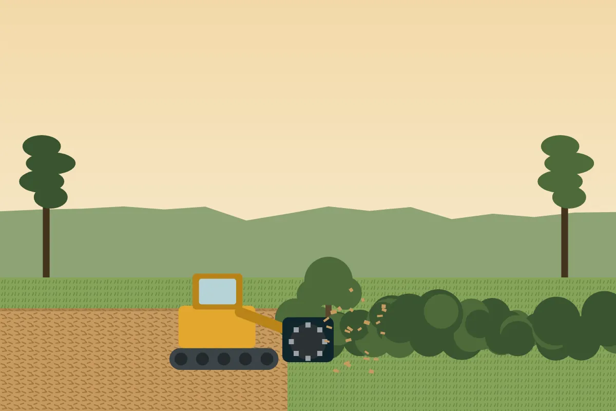 A tracked mulcher grinding small trees and brush into a mat of wood chips